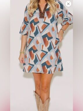 THML abstract  dress with faux leather accent. Perfect for spring festivals!